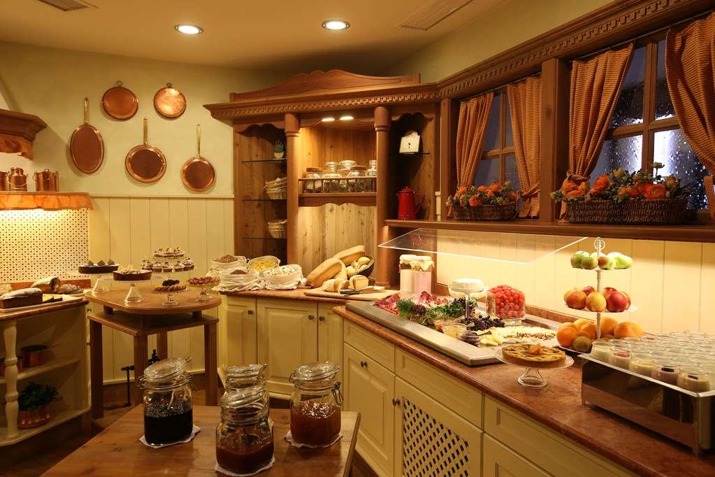 Alpen Suite Hotel Madonna Restaurant bilde